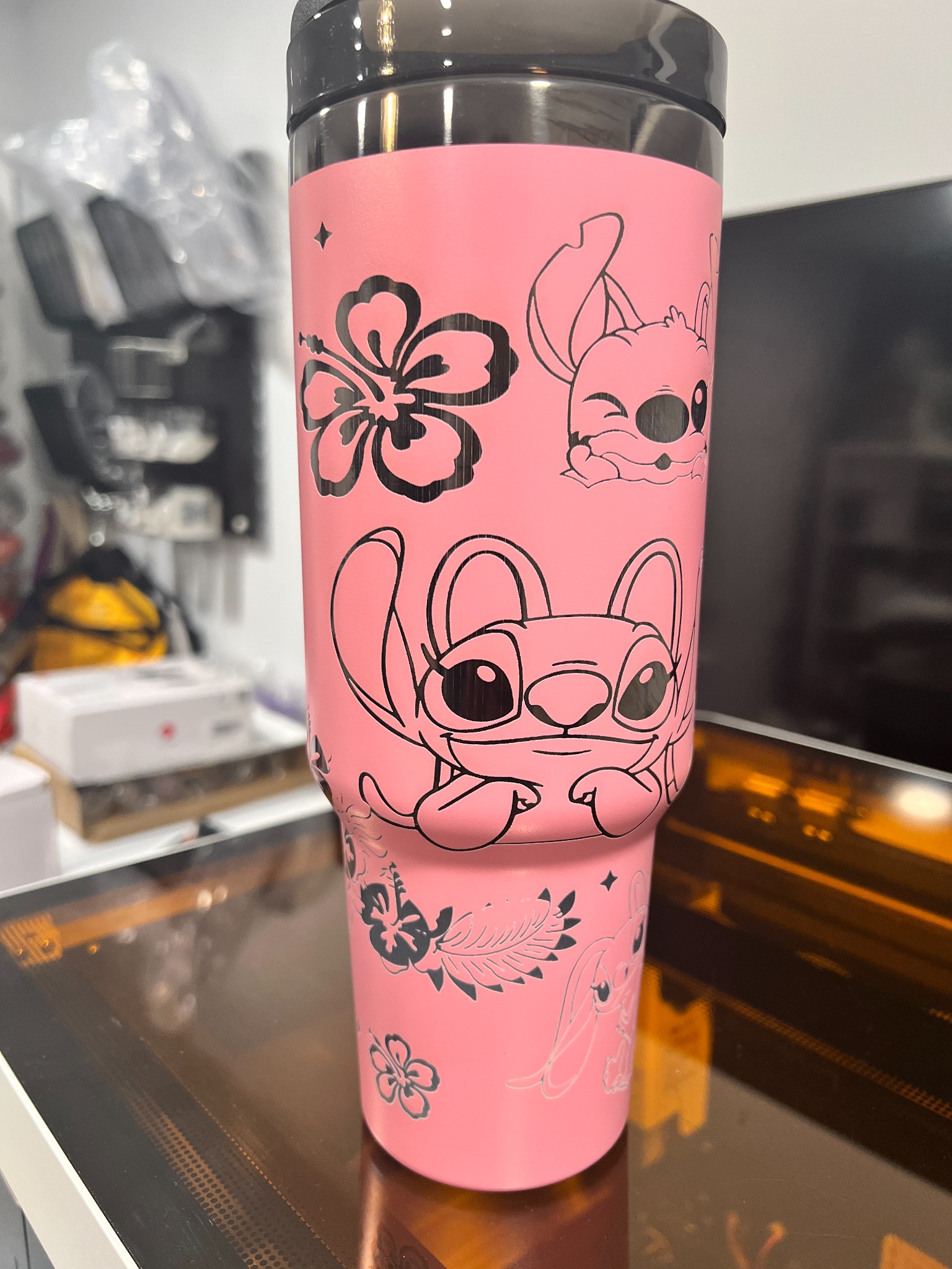 Pink character tumbler with floral line artwork
